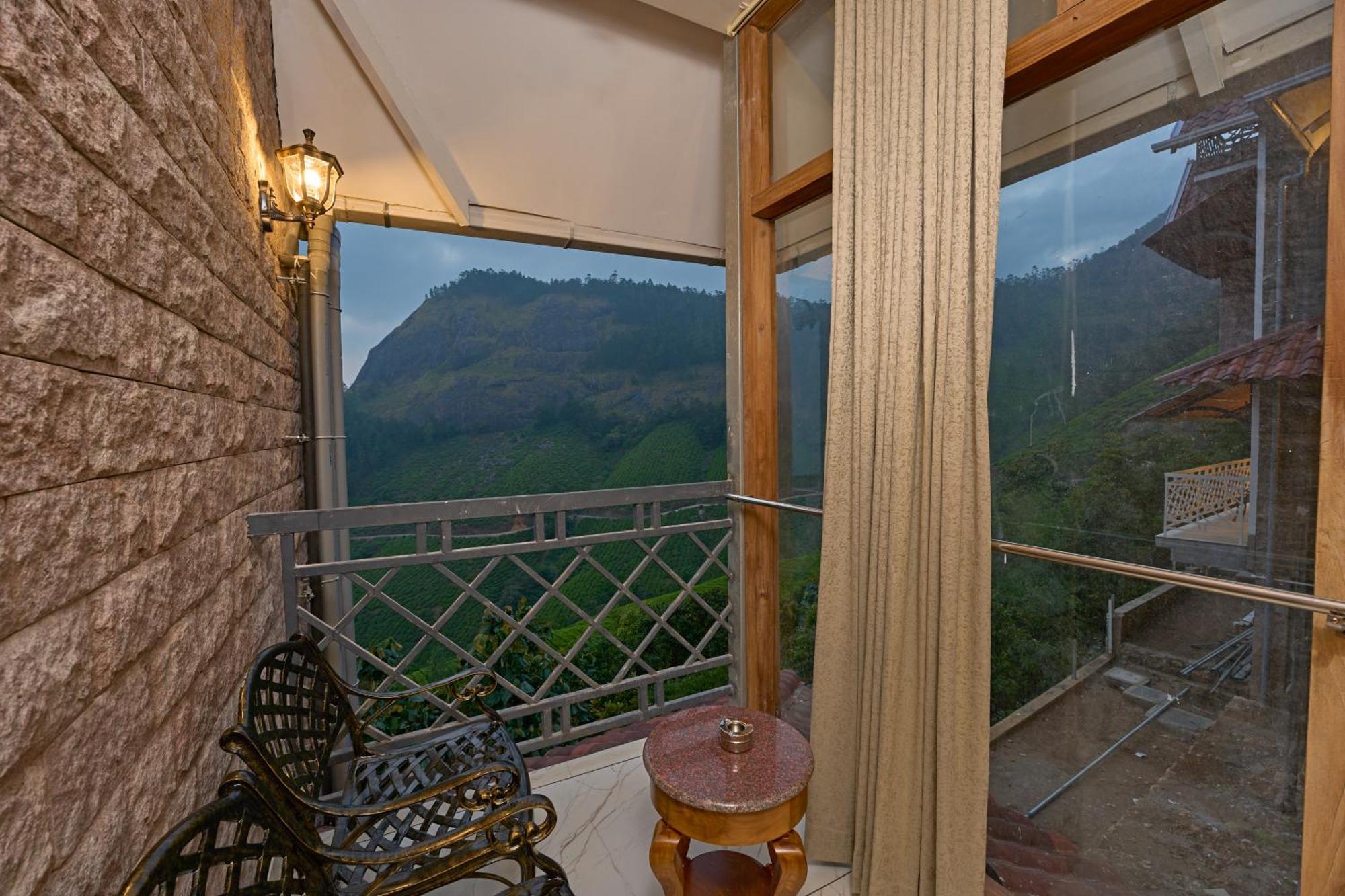 The Planet Munnar Hotel Suryanelli Bagian luar foto