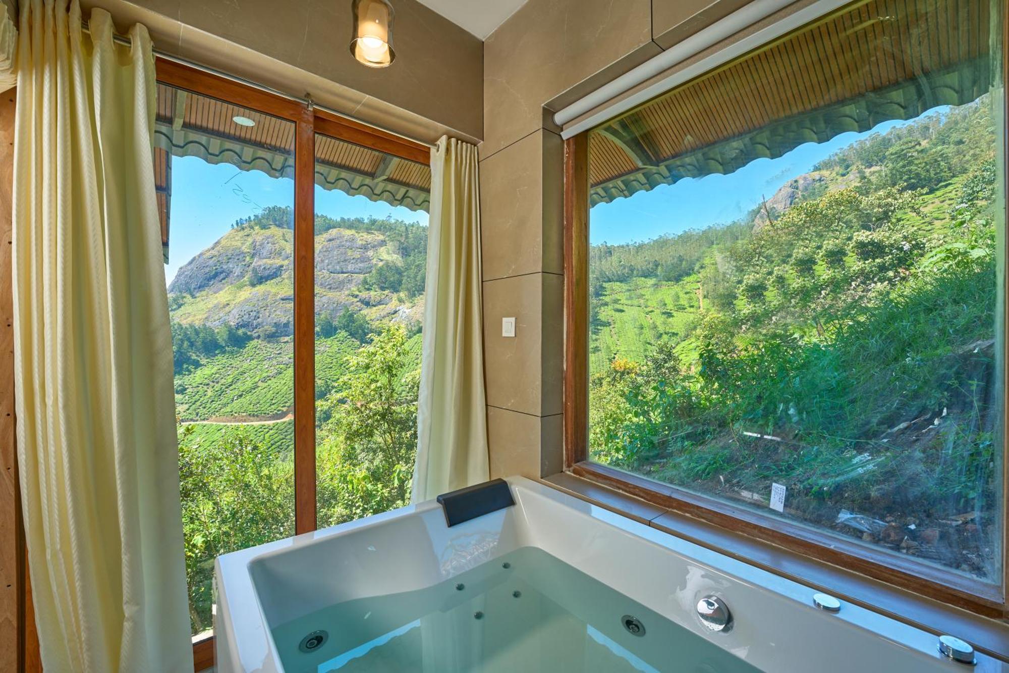 The Planet Munnar Hotel Suryanelli Bagian luar foto